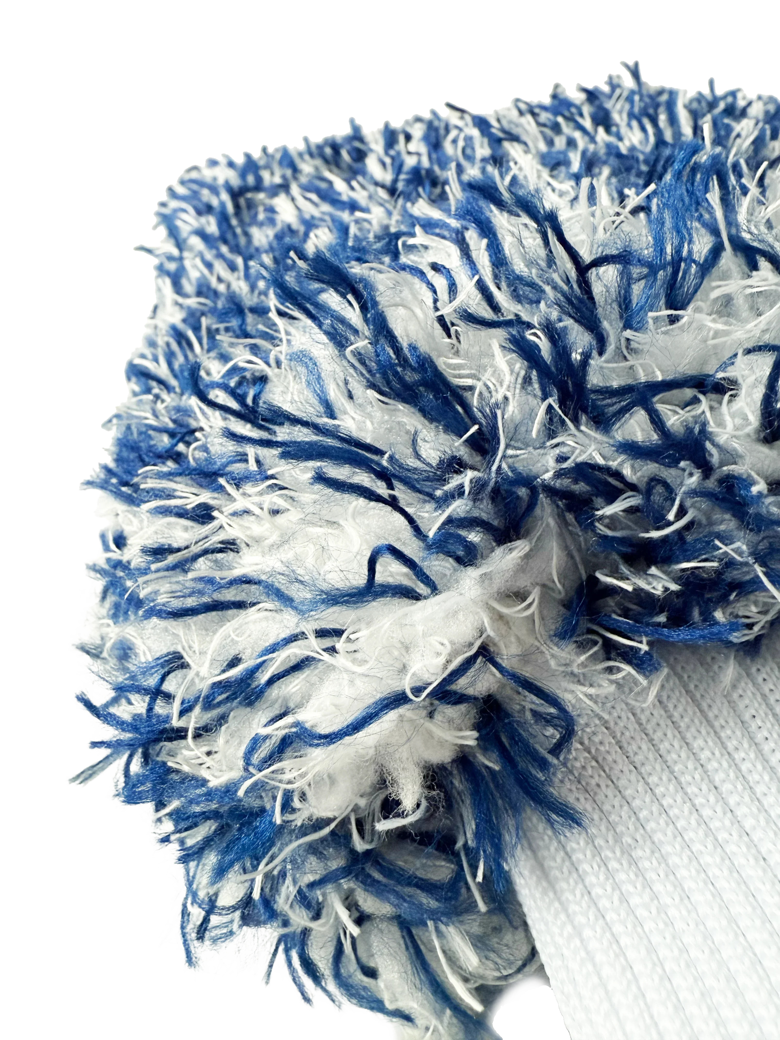 Ultra close-up of blue and white microfiber car wash mitt, ideal for ceramic coating care.